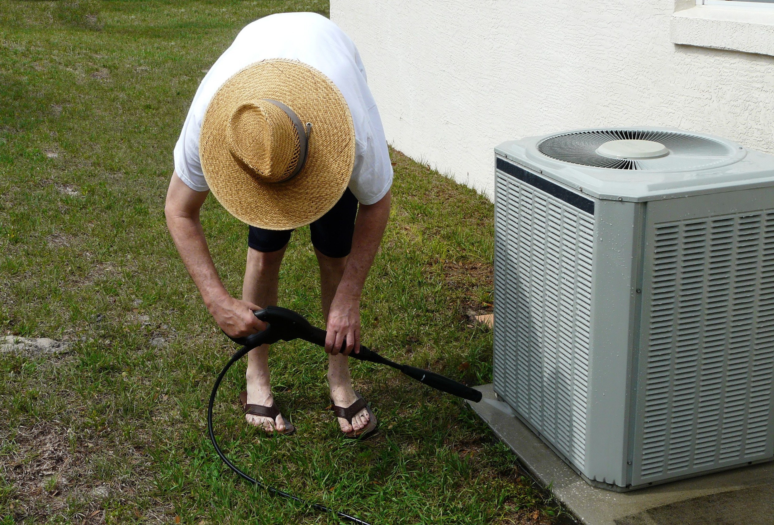 homeowner performing south jersey ac maintenance